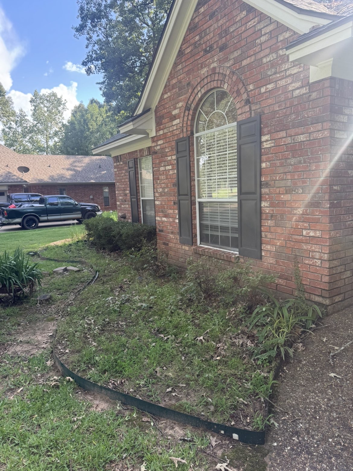 Front yard cleanup and fresh mulch beds before